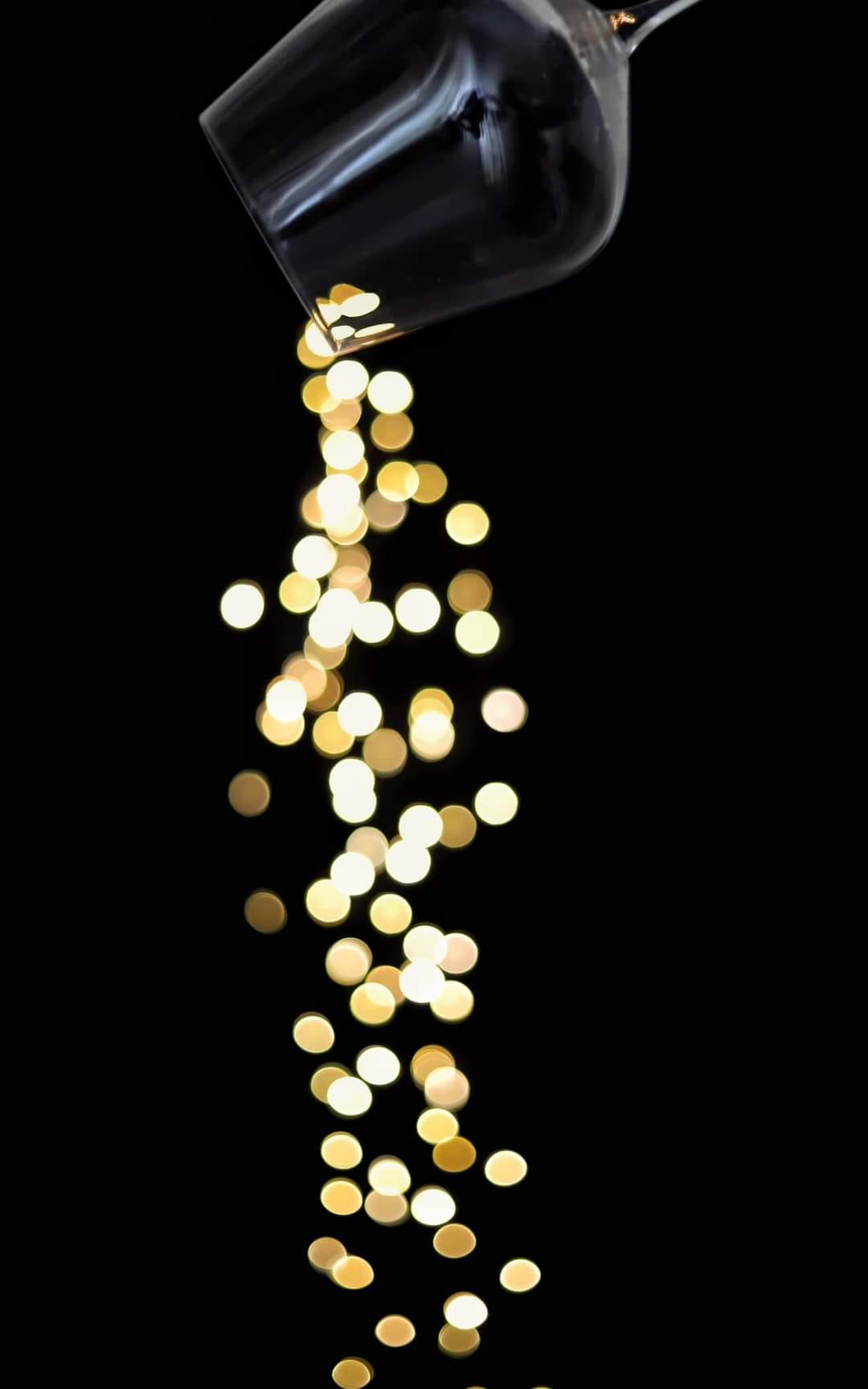 Confetti coming out of a glass